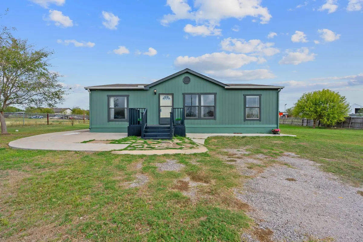 128 Monterrey Hills Dr, Del Valle, TX 78617 - Image #1