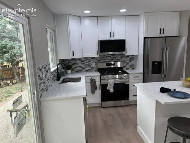 3465 Mosswood Lane, Colorado Springs, CO 80910 - #3