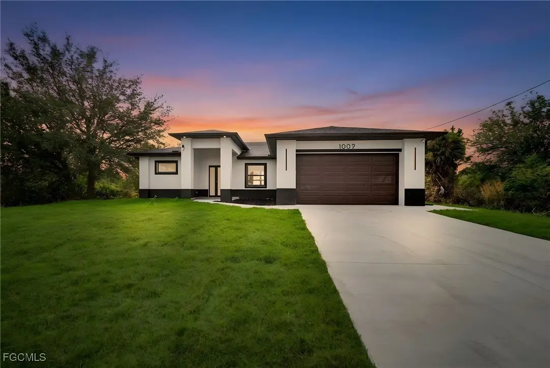 1002 Kanuga Street E, Lehigh Acres, FL 33974 - Image #1