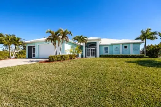 1309 NW 3rd Place, Cape Coral, FL 33993 - Image #1