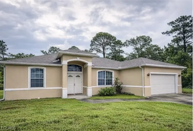 1203 Grant Boulevard, Lehigh Acres, FL 33974 - Image #1