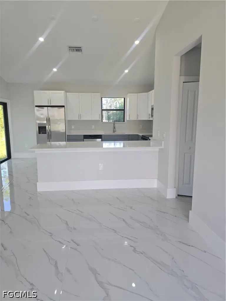 457 Woodman Drive, Lehigh Acres, FL 33972 - #2