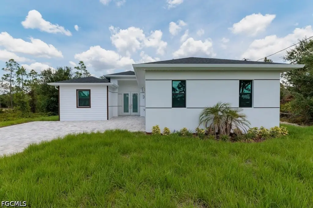 719 Almelia St E, Lehigh Acres, FL 33974 - #1