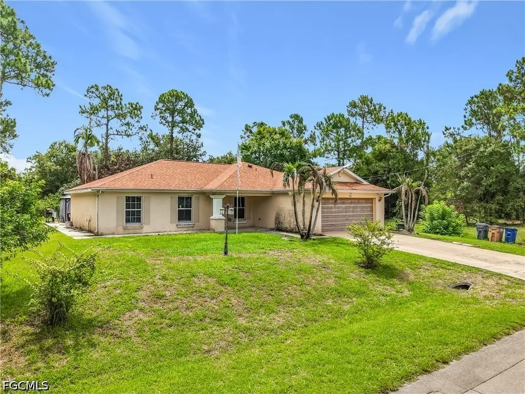 704 Moore Avenue, Lehigh Acres, FL 33972 - #1