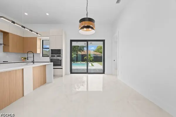 306 NE 11th Street, Cape Coral, FL 33909 - #3