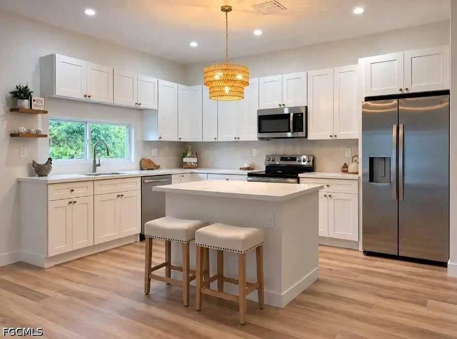 1102 E 11th Street, Lehigh Acres, FL 33972 - #2