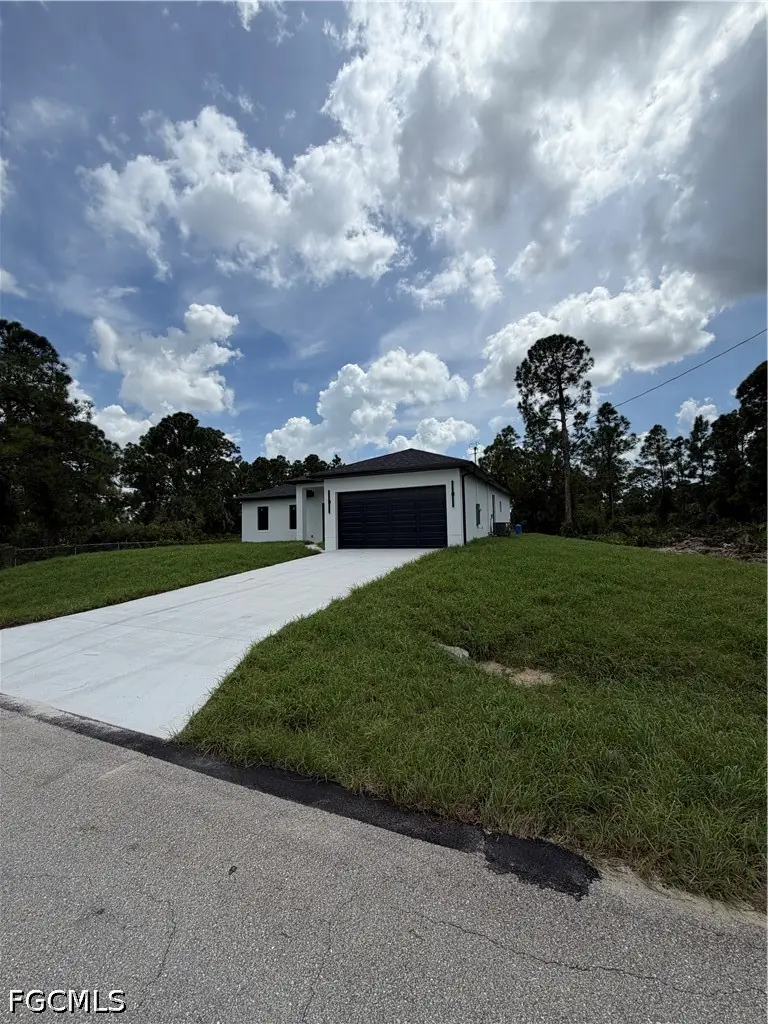 1052 Grove Street E, Lehigh Acres, FL 33974 - #3