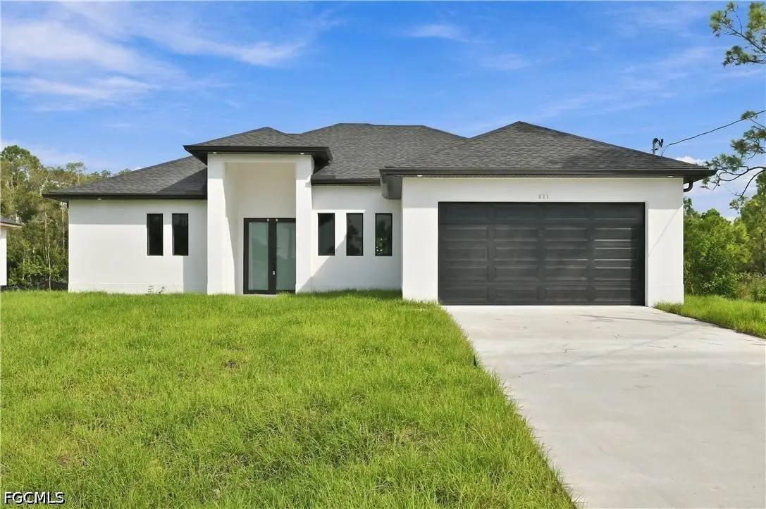 631 Foxchase Drive, Lehigh Acres, FL 33974 - #1