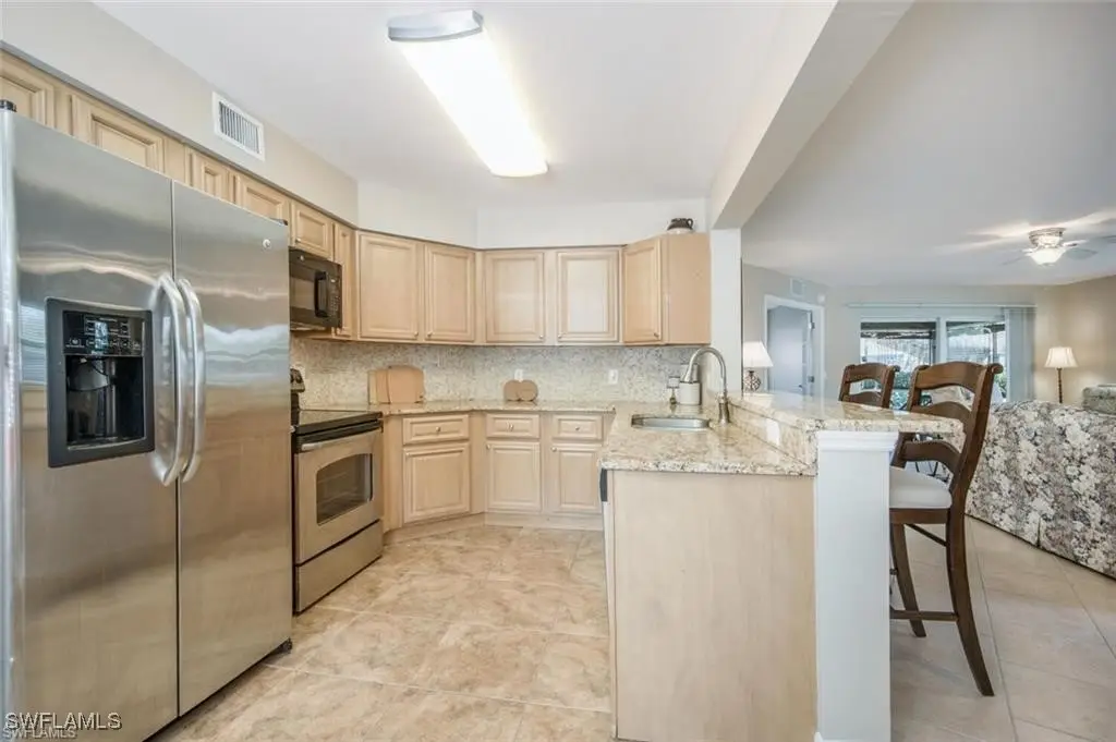 9589 Crescent Garden Drive #C-102, Naples, FL 34109 - Image #1