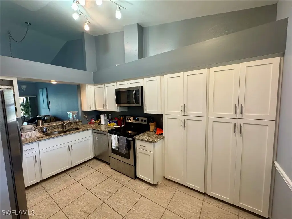 501 Lake Louise Circle #203, Naples, FL 34110 - Image #1