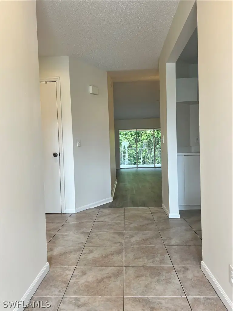 7791 Esmeralda Way #L203, Naples, FL 34109 - #2