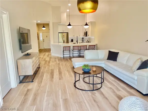 7741 Pebble Creek Circle #302, Naples, FL 34108