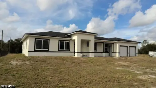 1715 Mcarthur Avenue, Lehigh Acres, FL 33972