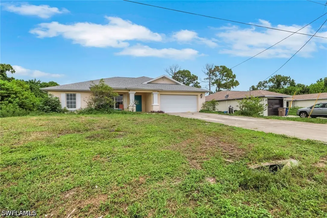 277 Grant Boulevard, Lehigh Acres, FL 33974 - #1
