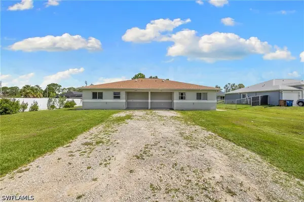 909/911 Jaguar Boulevard, Lehigh Acres, FL 33974