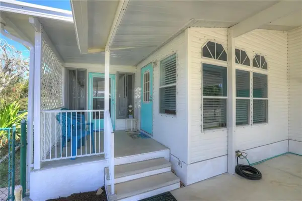 295 Papaya Circle, Barefoot Bay, FL 32976