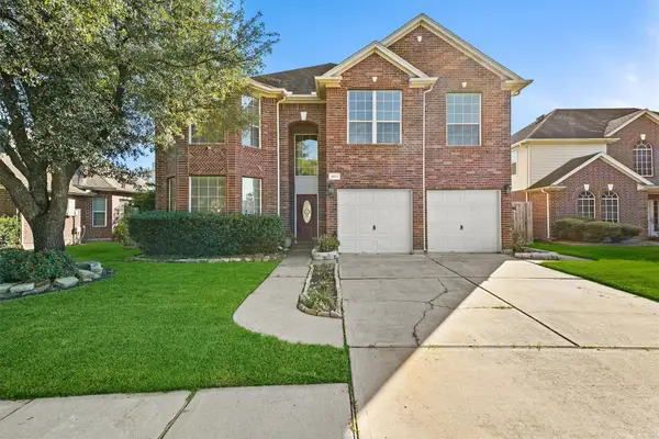 18914 Woodglen Shadows Drive, Humble, TX 77346