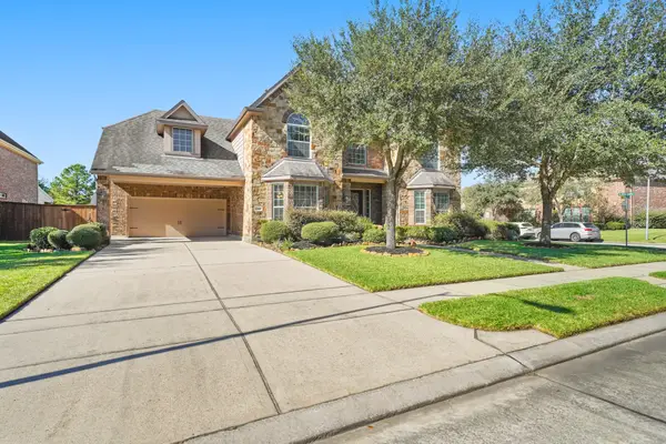 13911 Sunfall Creek Lane, Humble, TX 77396