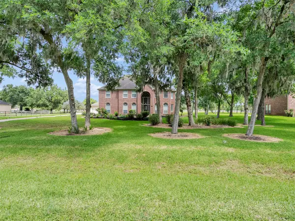 7119 Rustling Oaks Drive, Richmond, TX 77469