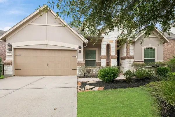 11 Whispering Thicket Place, The Woodlands, TX 77375