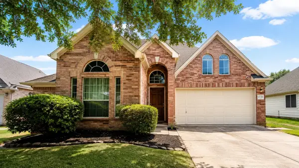 8726 Rollick Drive, Tomball, TX 77375