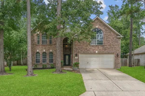 23 Murmuring Creek Place, Conroe, TX 77385