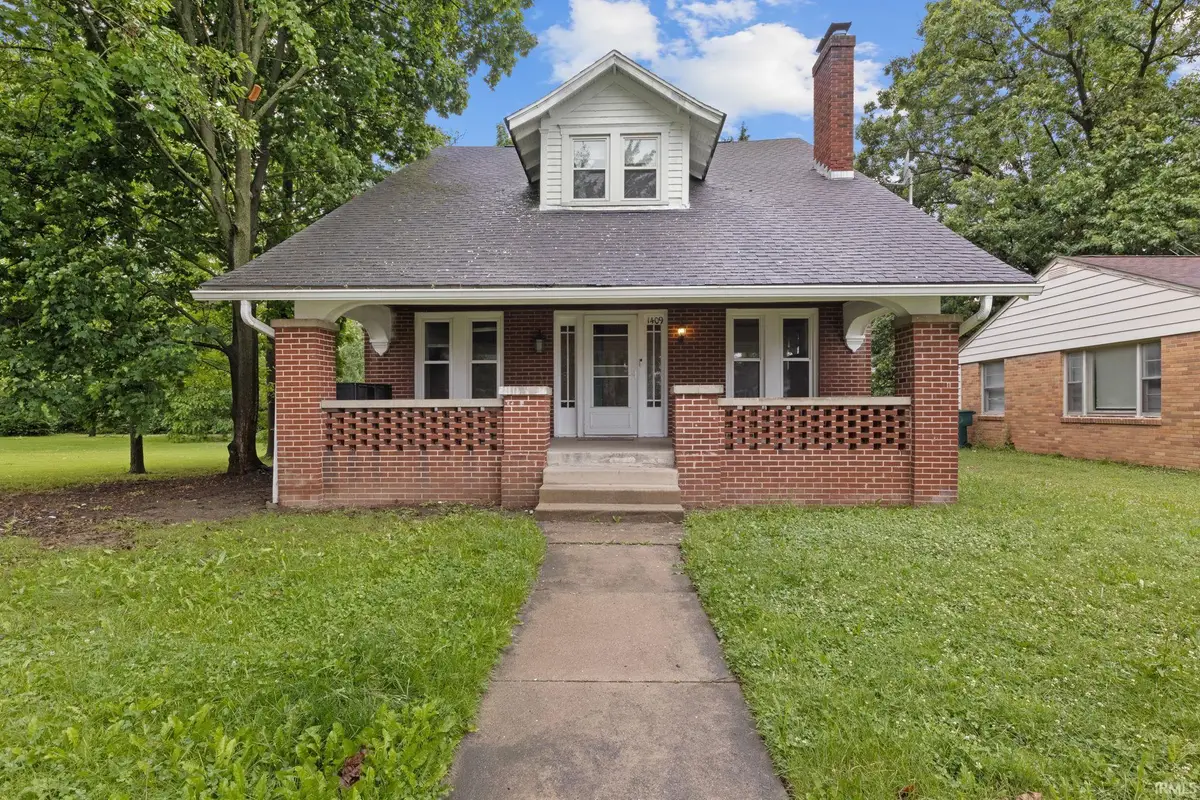 1409 N Woodridge Avenue, Muncie, IN 47304 - #1