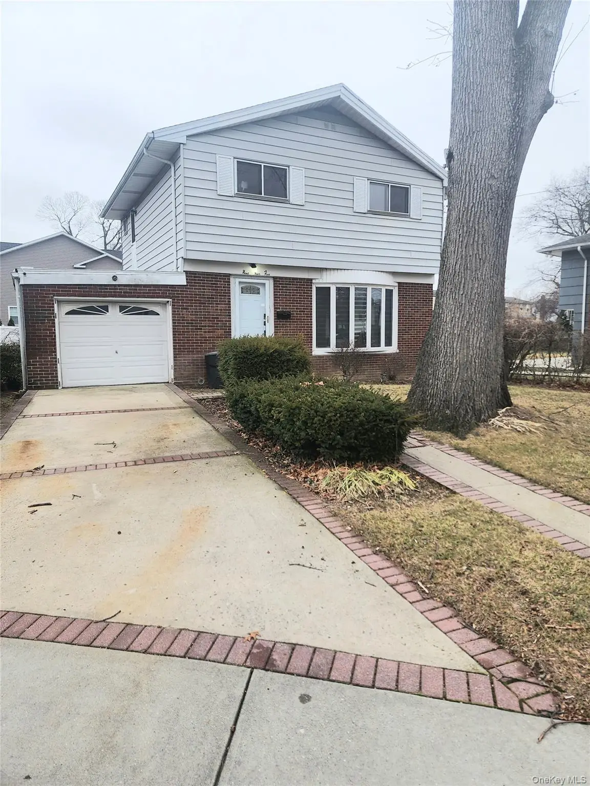 945 Derrick Adkins Lane, West Hempstead, NY 11552 - Image #1