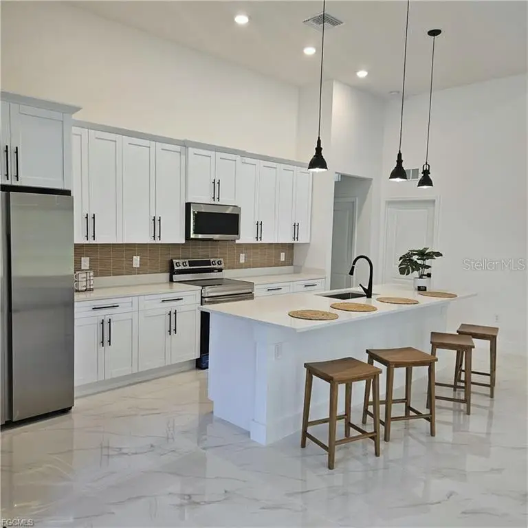 113 Monroe Avenue, Lehigh Acres, FL 33936 - #3