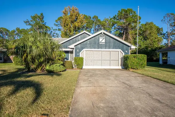22 Whispering Pine Drive, PALM COAST, FL 32164