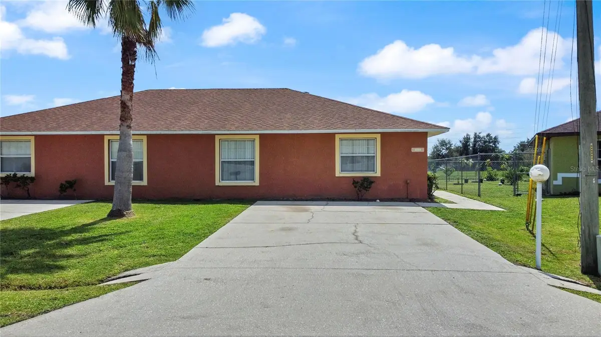 869 Adour Drive #A/B, Poinciana, FL 34759 - Image #1