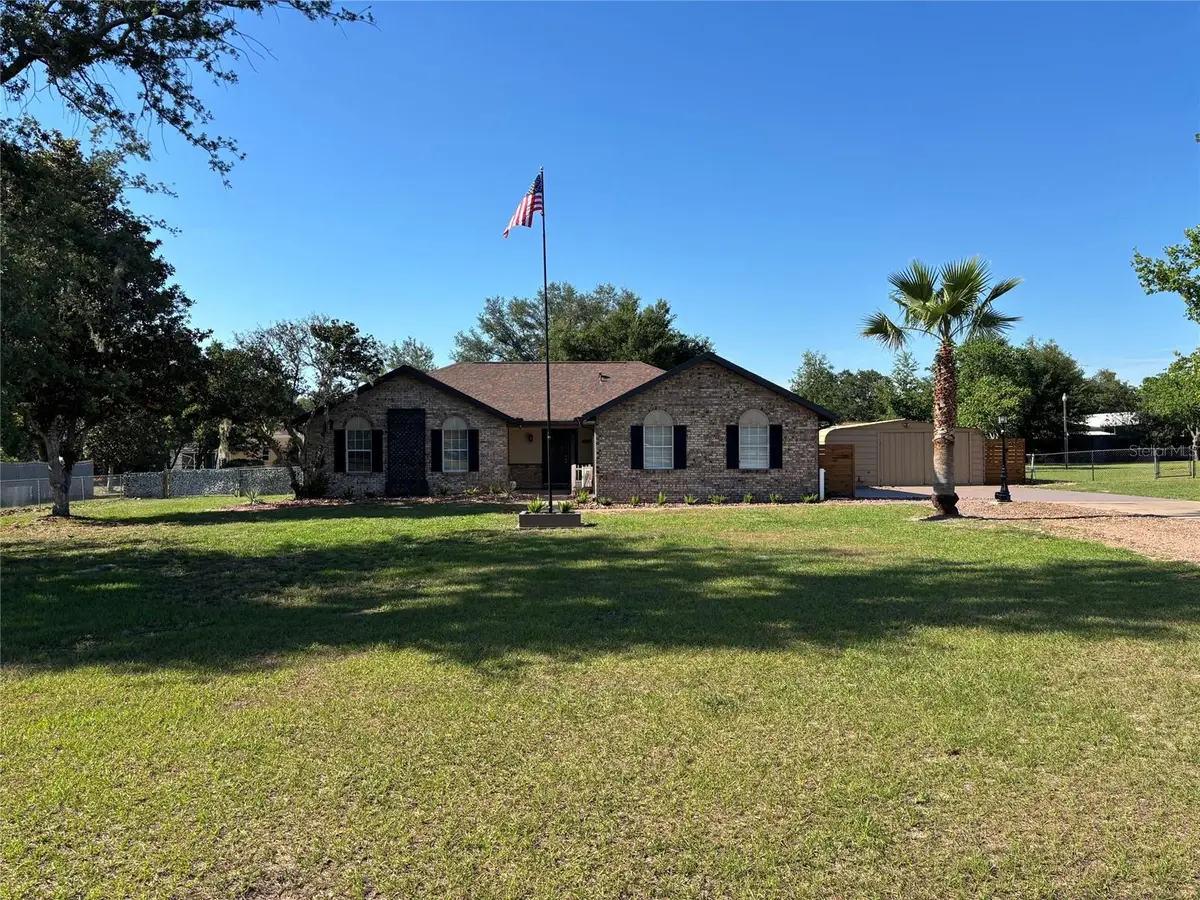 9801 SE Sunset Harbor Road, Summerfield, FL 34491 - #1