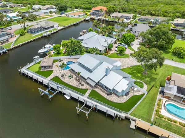 123 Queen Ann Court, HUTCHINSON ISLAND, FL 34949