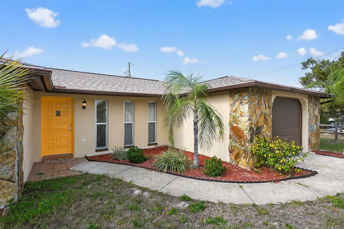 1037 Tamarac Drive, Holiday, FL 34690 - Image #1