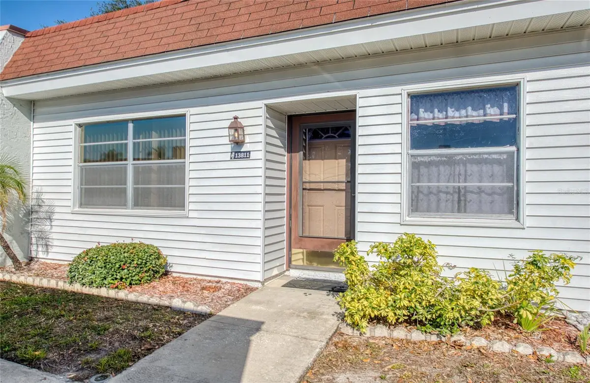 13811 Mission Oaks Boulevard #E, Seminole, FL 33776 - Image #1