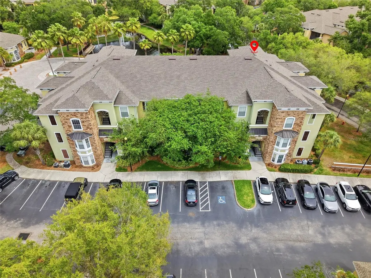 9916 Courtney Palms Boulevard #302, Tampa, FL 33619 - #1