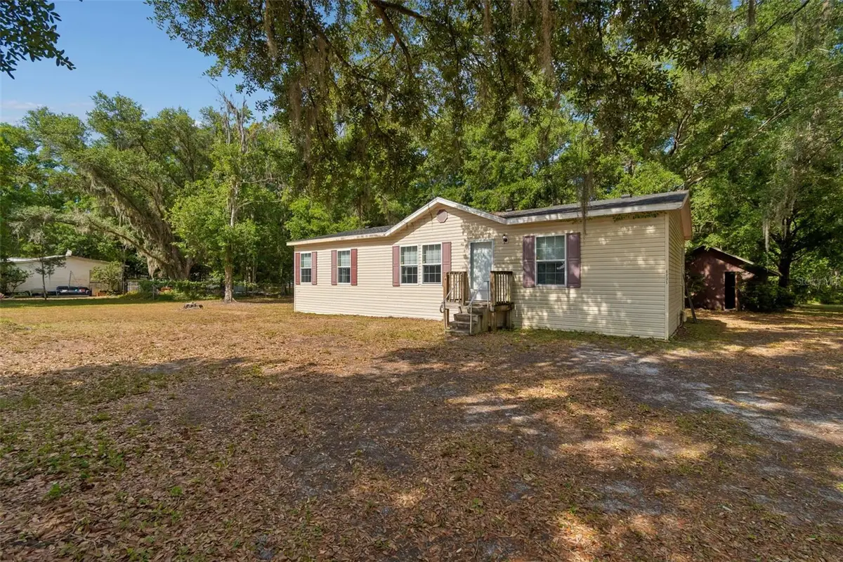 6735 Ravenwood Street, Wesley Chapel, FL 33544 - #1