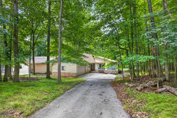 9855 Golf Port Drive N, Canadian Lakes, MI 49346