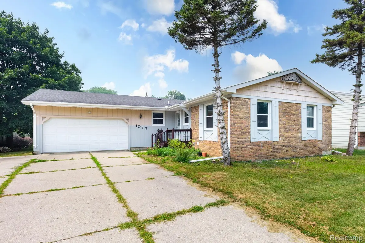 1047 Coolidge Road, Lansing, MI 48912 - #1