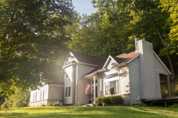 8824 Grand River Drive SE, Ada, MI 49301