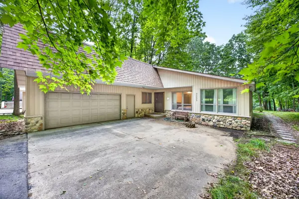 9855 Golf Port Drive N, CanadianLakes, MI 49346