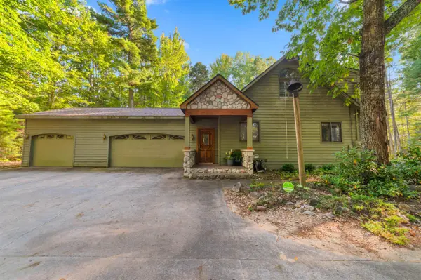6993 NW Aarwood, RapidCity, MI 49676