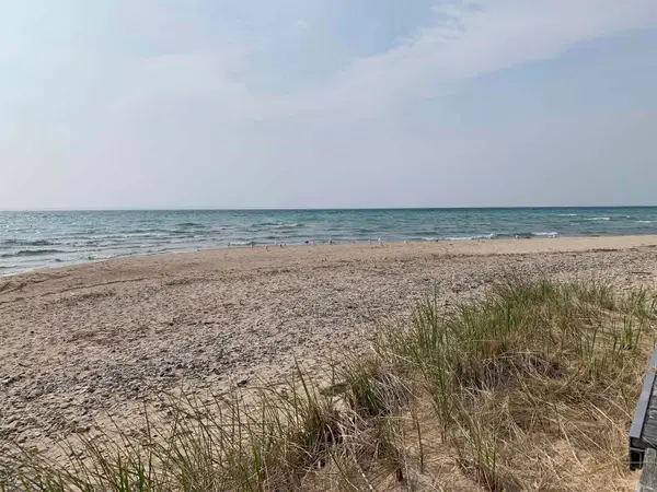 410 Golden Beach DR, Kewadin, MI 49648