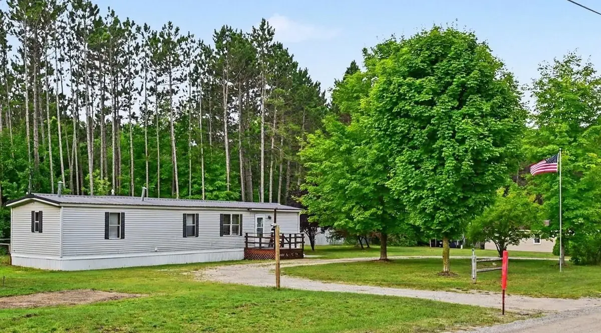 5925 Pine Aire DR, Grawn, MI 49637 - #1