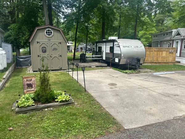 2757 Owens Unit 65 Drive, Houghton Lake, MI 48629