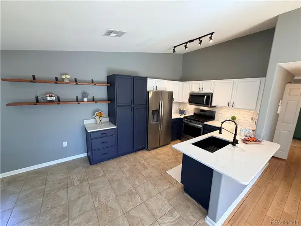8485 Pebble Creek Way #203, Highlands Ranch, CO 80126