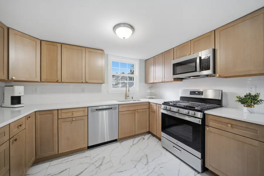 57 Corbett St, Lowell, MA 01852 - #2