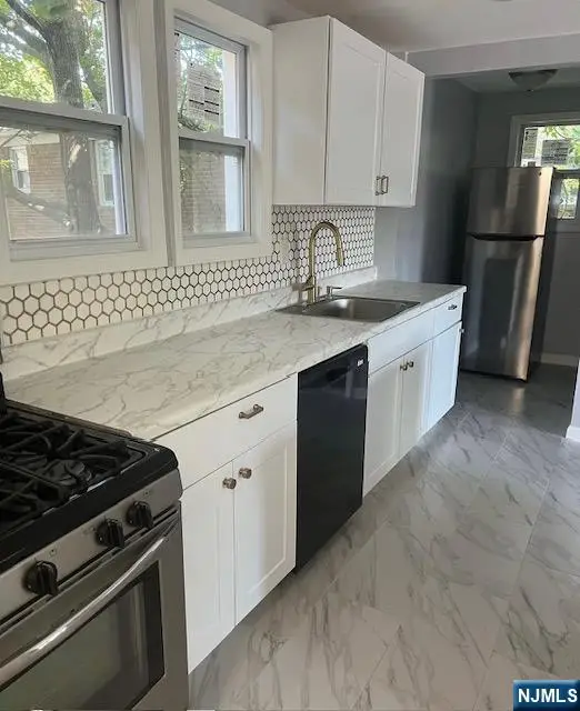 210-212 Temple Street, Paterson, NJ 07522 - #1