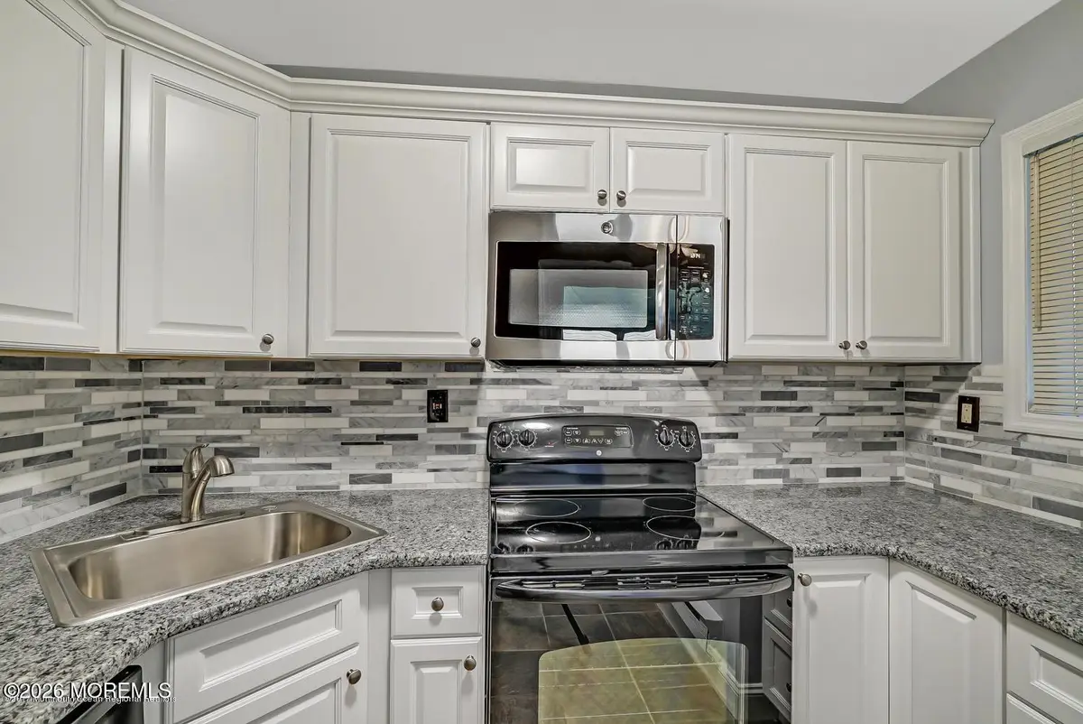 87 Arrowood Road #E, Manalapan, NJ 07726 - #1