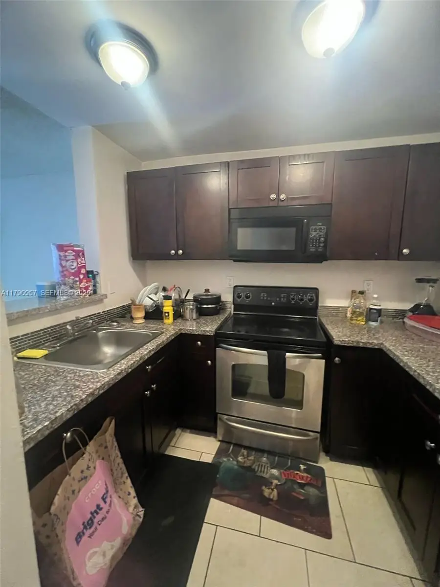 482 NW 165th St Road #A203, Miami, FL 33169 - #1